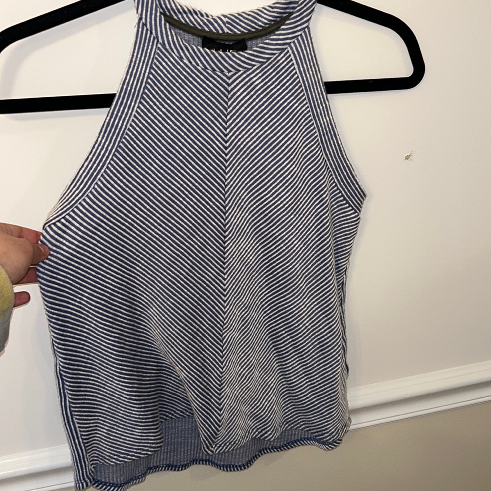 Blue and white striped sleeveless top